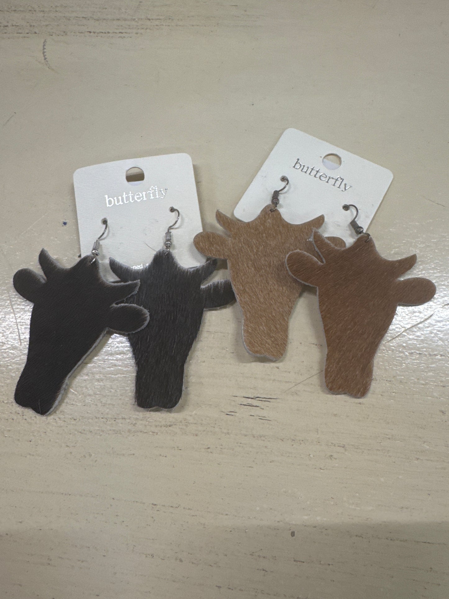 BUTTERFLY-COW HIDE EARRING-BROWN