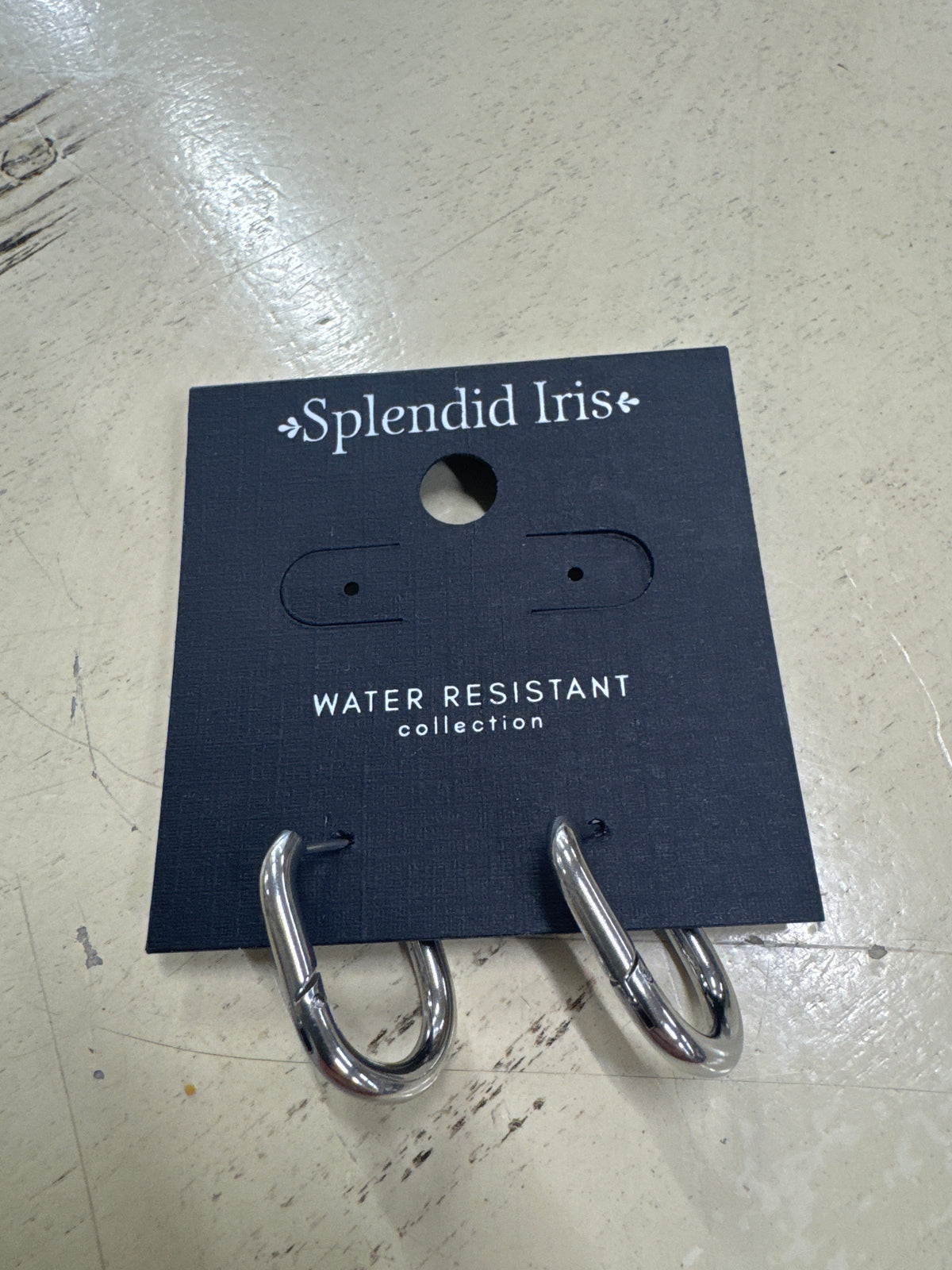 SPLENDID IRIS-CONTEMPORARY WIDE OVAL HOOPS-SILVER