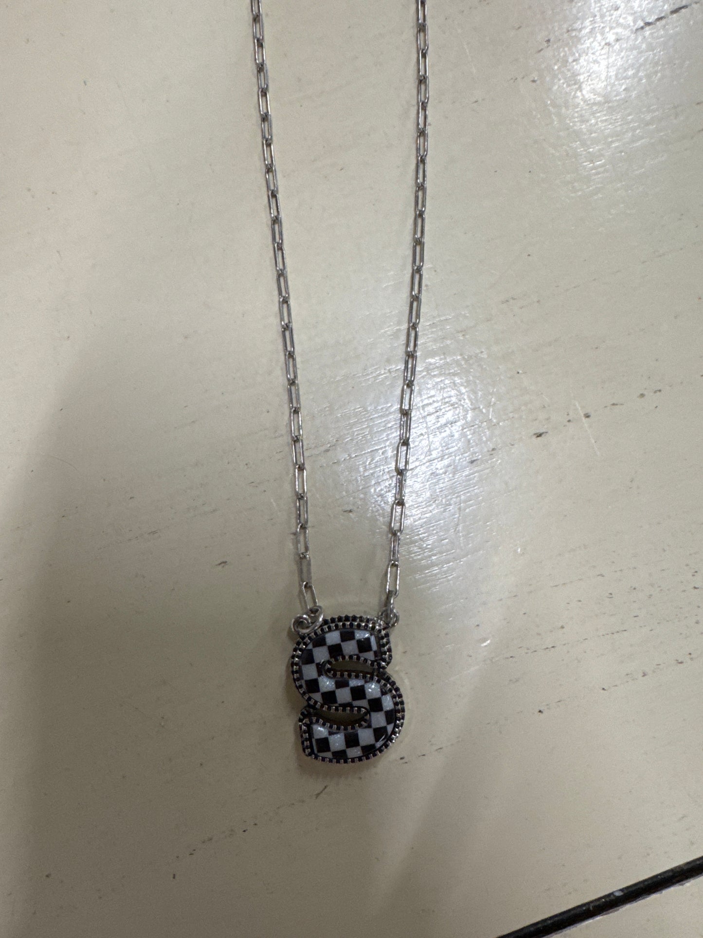 BLK/WHITE CHECKERED INTIL NECKLACE