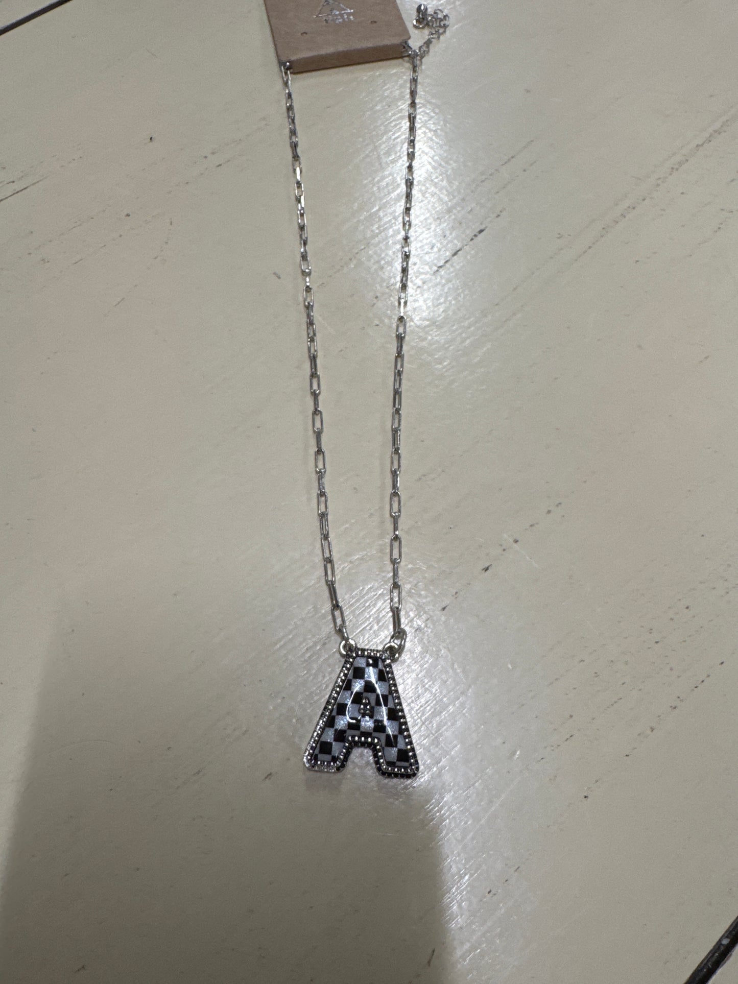 BLK/WHITE CHECKERED INTIL NECKLACE