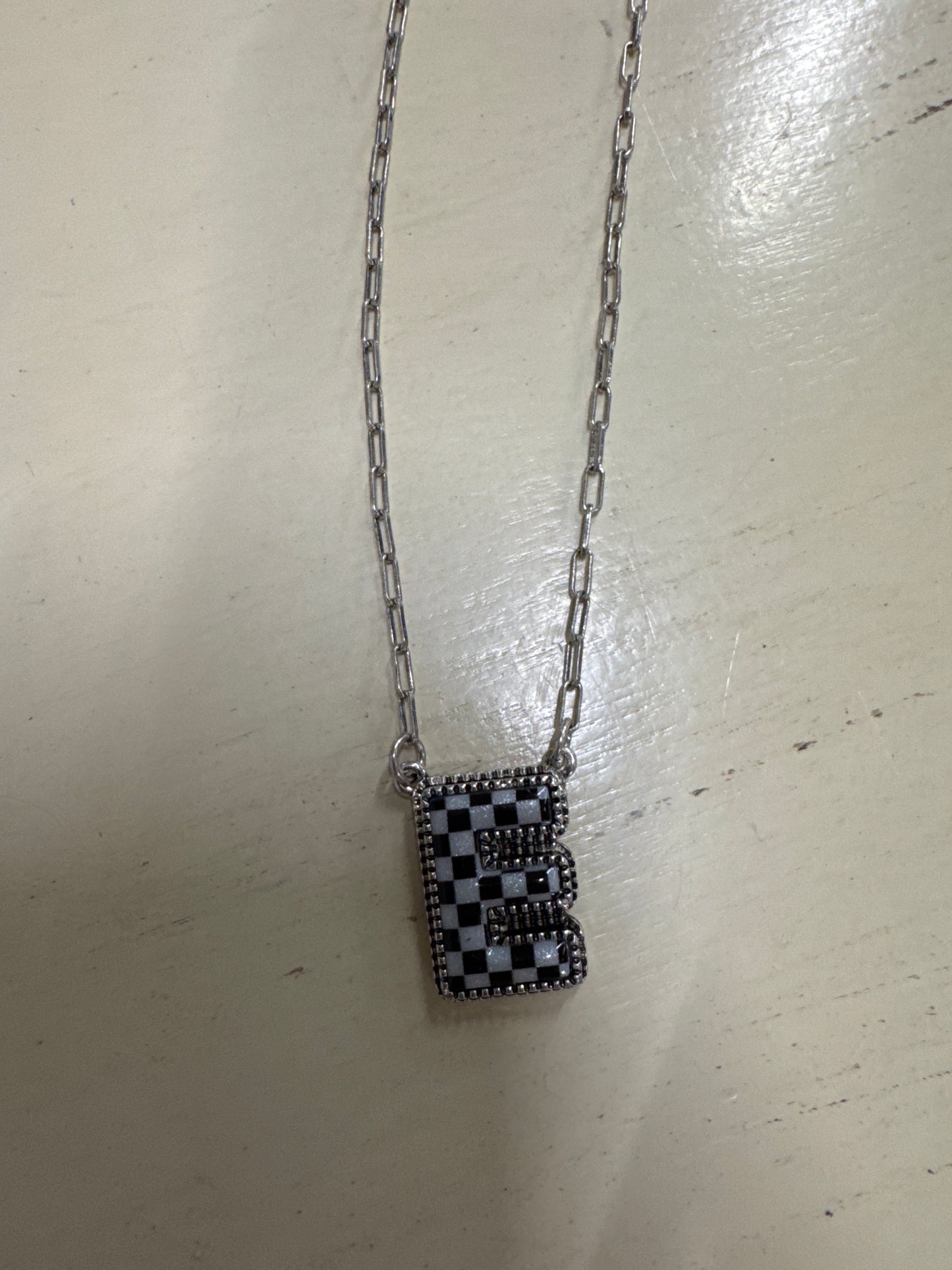 BLK/WHITE CHECKERED INTIL NECKLACE
