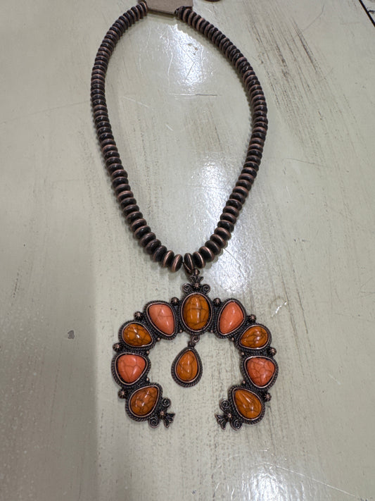 BRONZE NECKLACE W/ORANGE SQUASH BLOSSOM