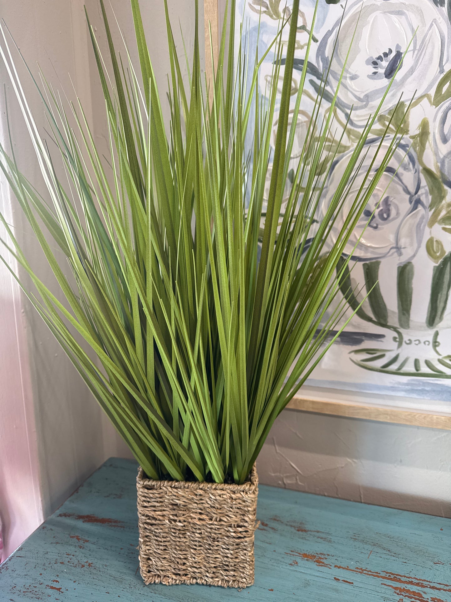 GREENERY IN WICKER BASKET