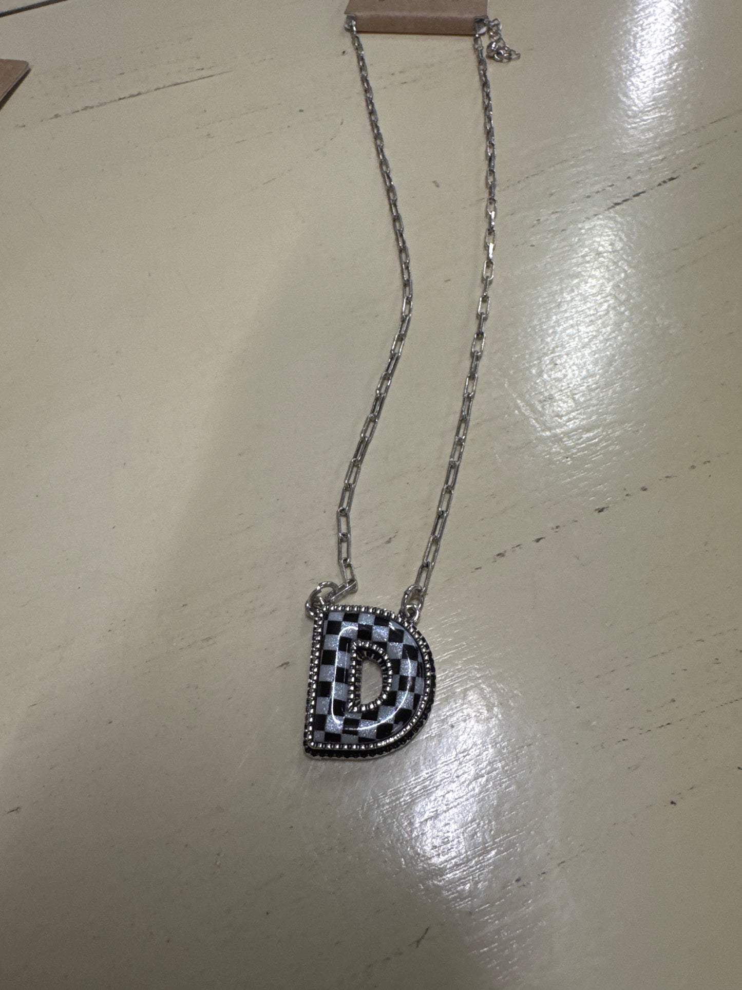 BLK/WHITE CHECKERED INTIL NECKLACE