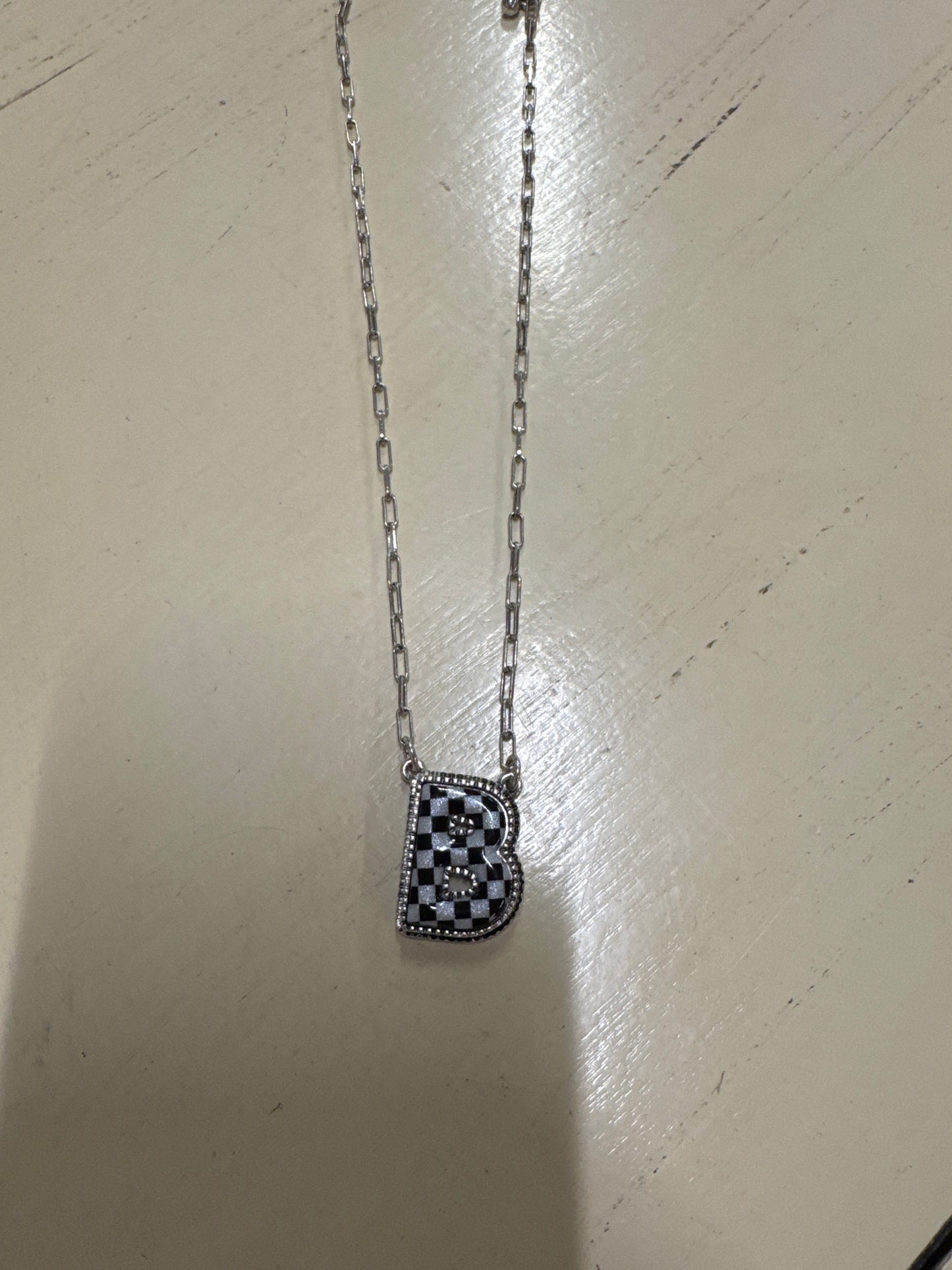 BLK/WHITE CHECKERED INTIL NECKLACE