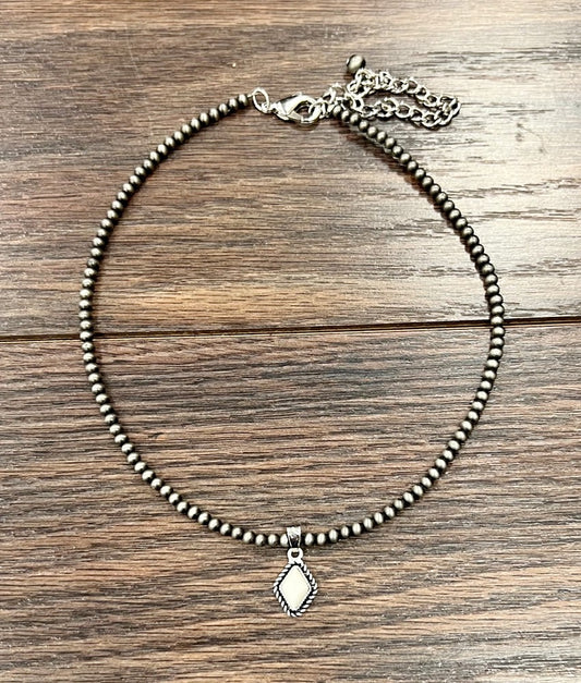 ISAC NAVAJO PEARL IVORY STONE