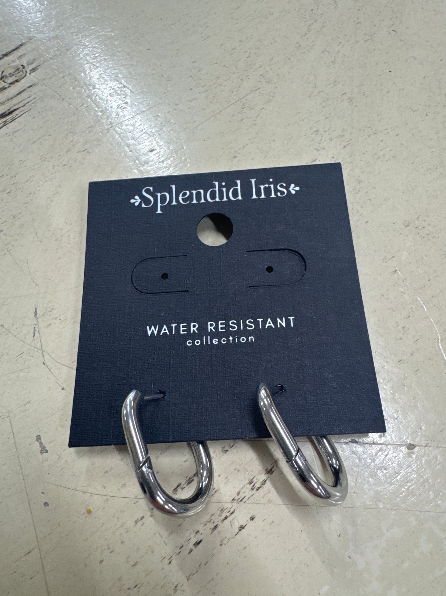 SPLENDID IRIS-CONTEMPORARY WIDE OVAL HOOPS-SILVER