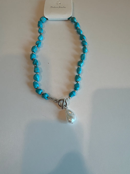 TURQUOISE NECKLACE WITH WHITE PEARL LIKE CHARM