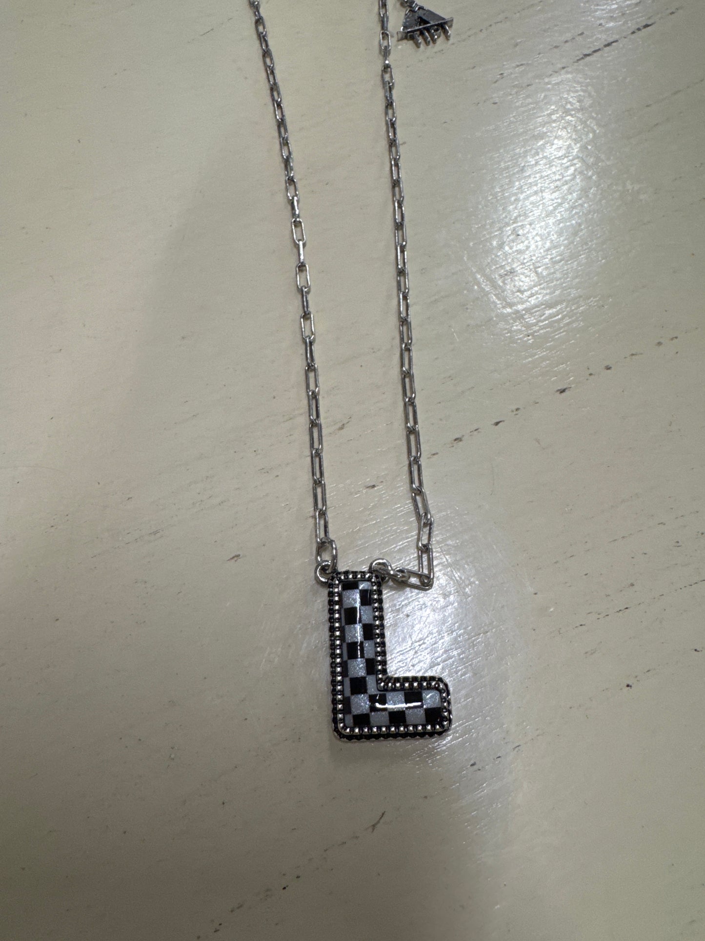 BLK/WHITE CHECKERED INTIL NECKLACE