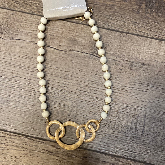 GARDEN PARTY IVORY BEAD W/GOLD CIRCLES
